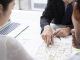 Couple who are considering a real estate investment